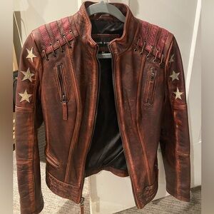 Wilsons/Black Rivet Leather Jacket Women's Sz Small Stars/Stripes. Never worn.